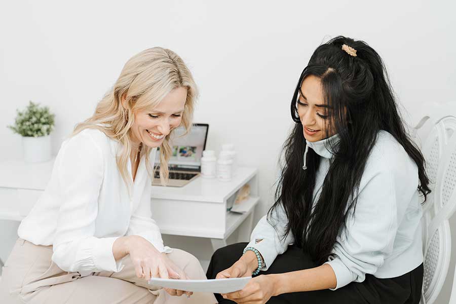 naturopathic physician and patient check hormonal balance